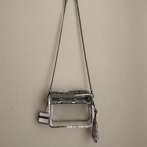 Snakeskin policy handbag